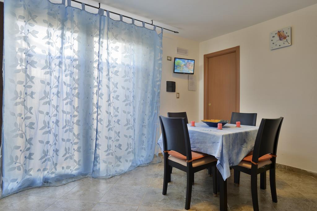 Appartamento Le Palme Alghero Szoba fotó
